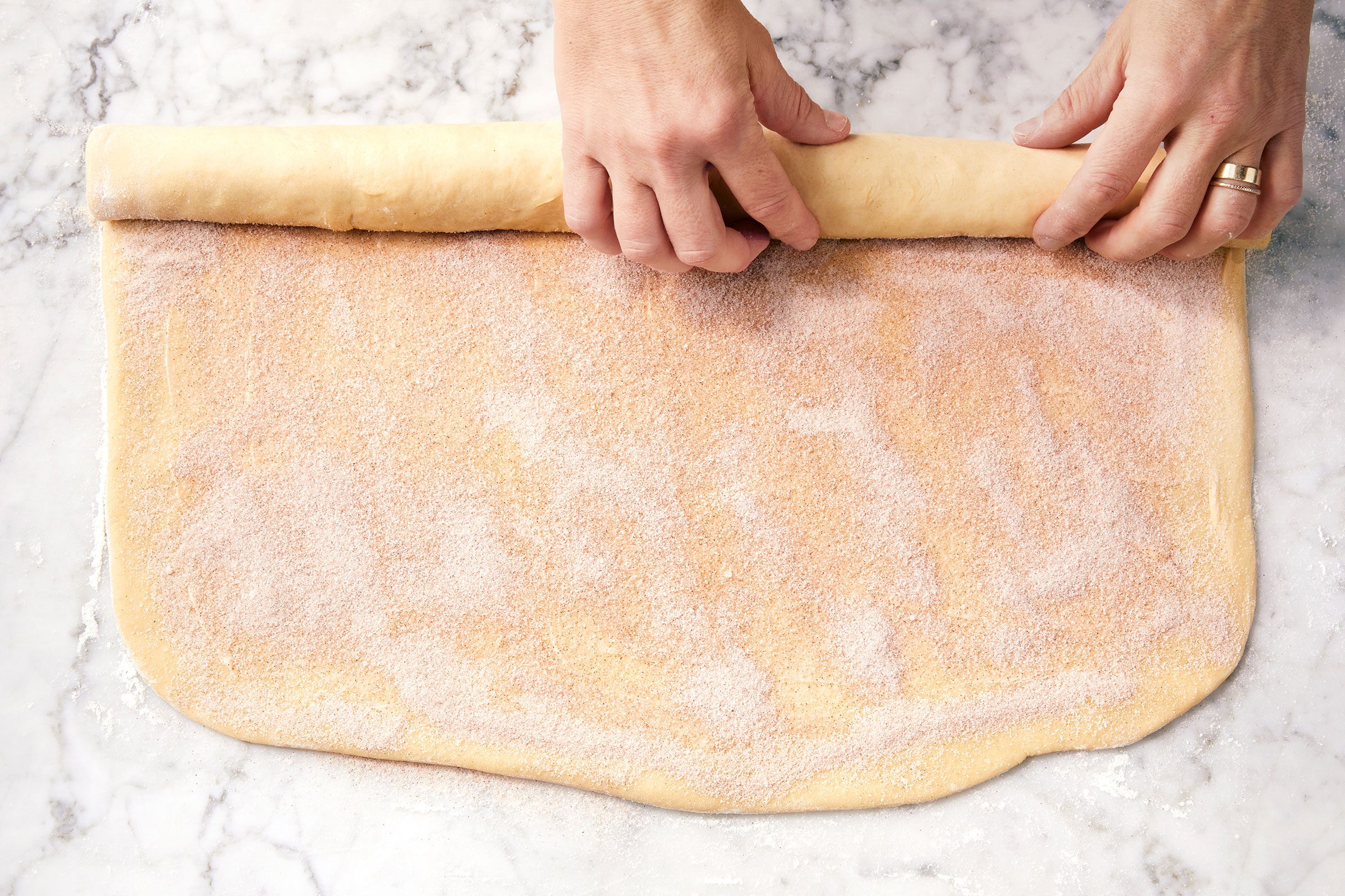 Rolling up dough sheet in jelly roll style