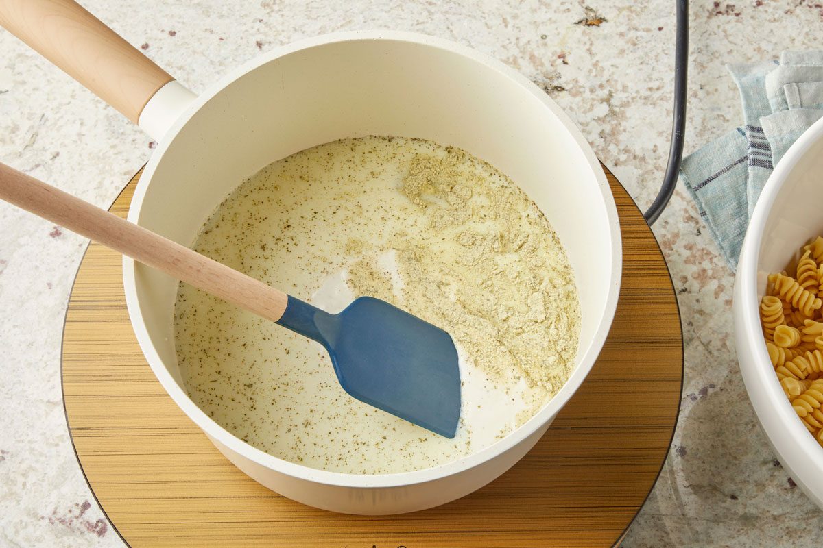 In the same pan, combine milk, ranch salad dressing and salad dressing mix until smooth