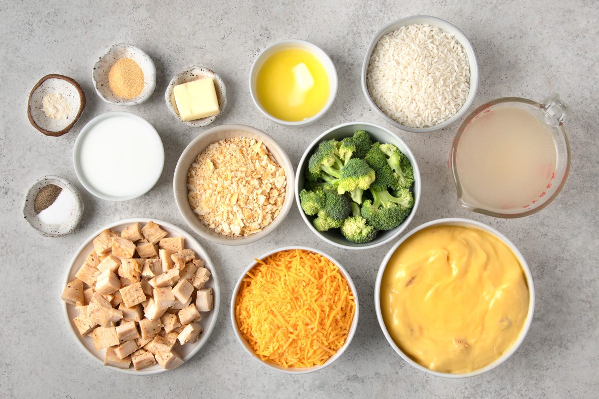 overhead shot of Chicken broccoli casserole ingredients placed over gray background