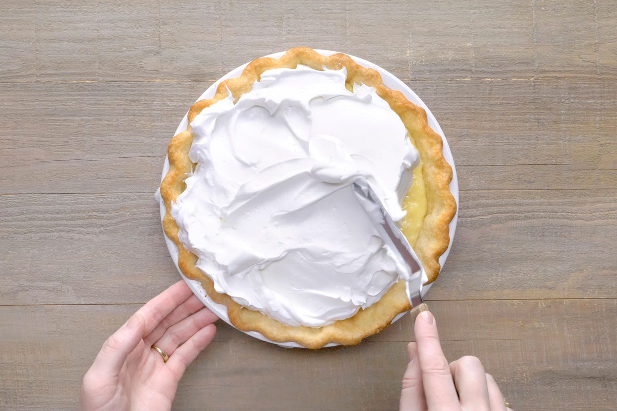 Spread meringue evenly over filling, sealing to edge of crust.