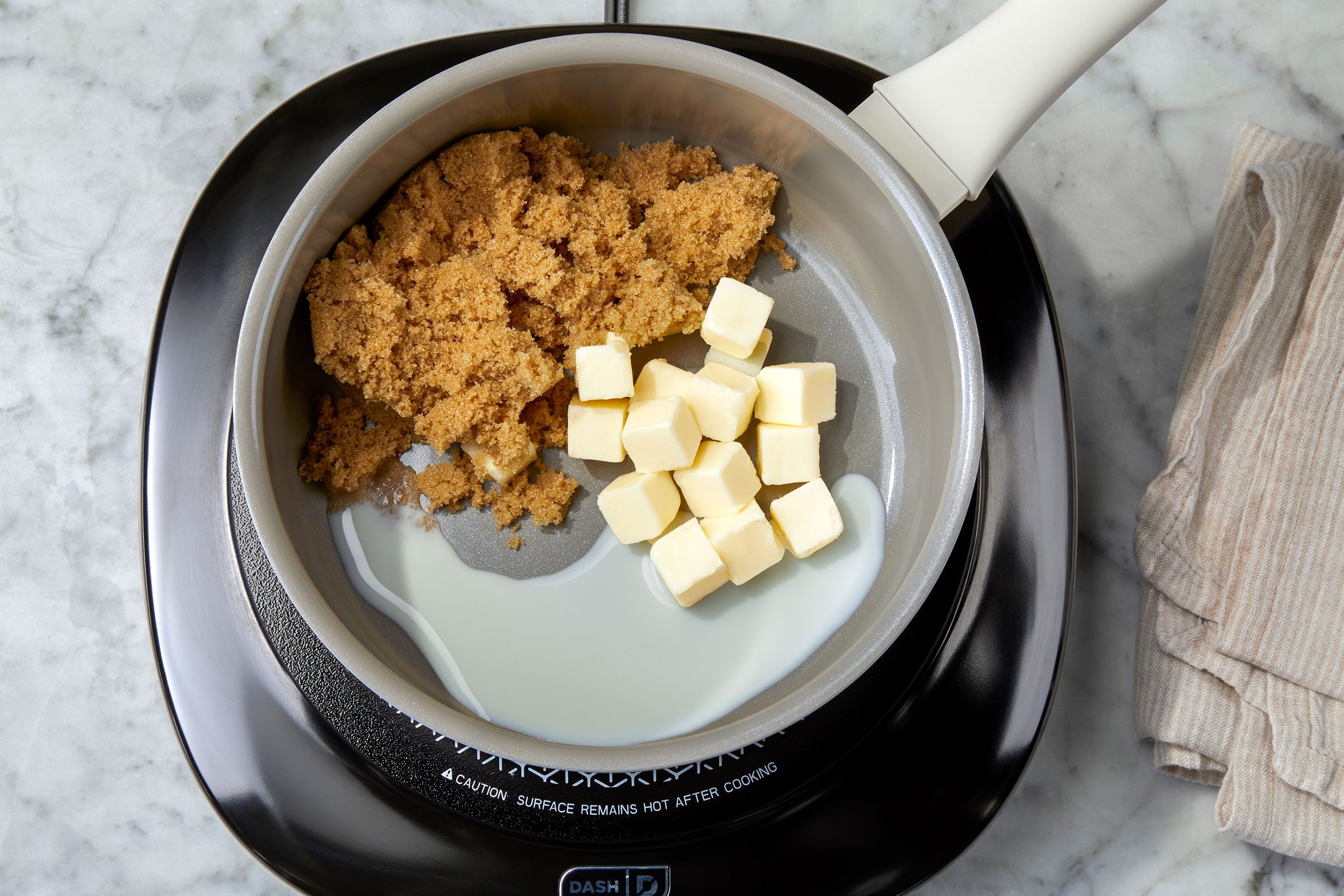 Brown sugar, butter and milk in a saucepan