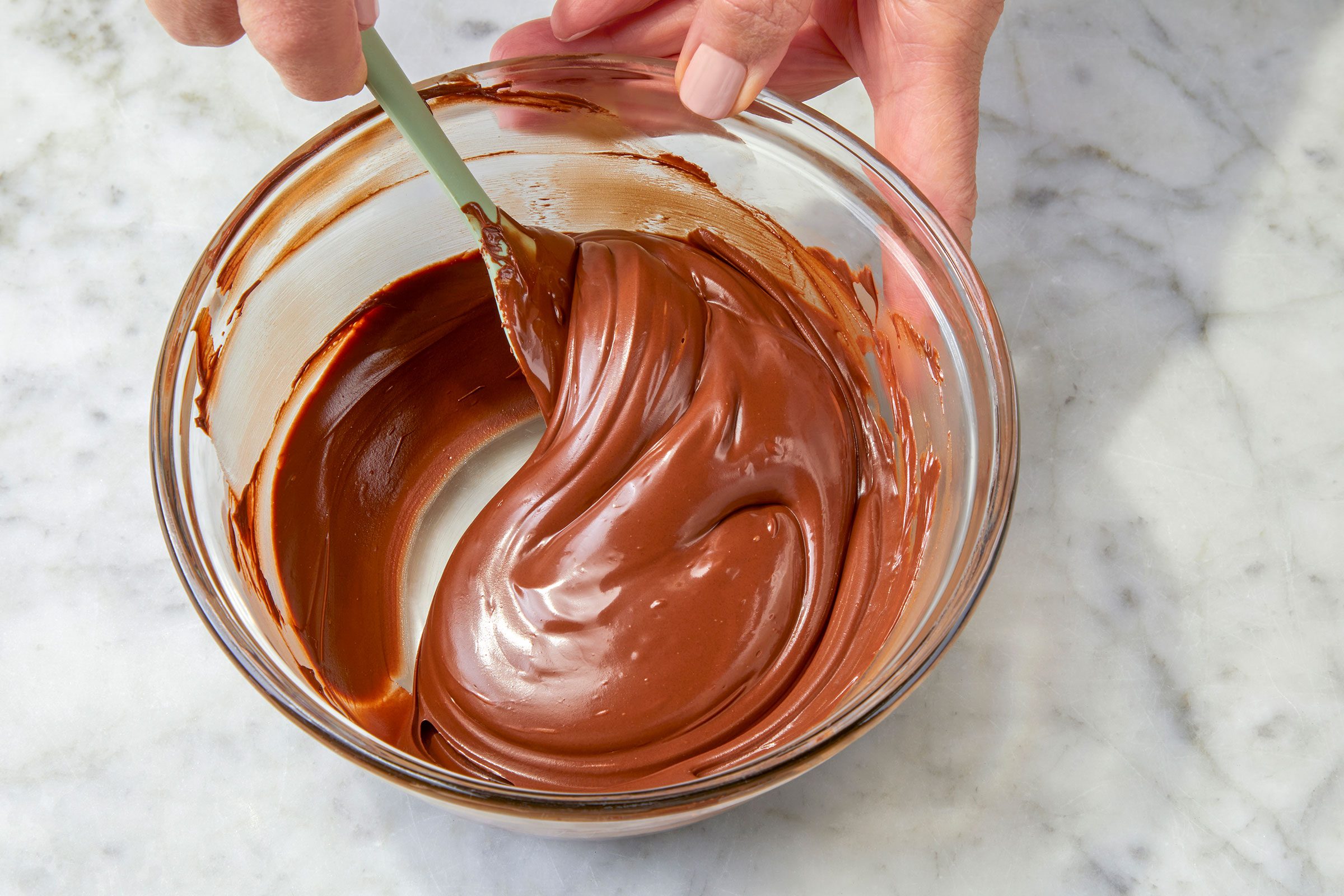 Melted chocolate chips in a small bowl 