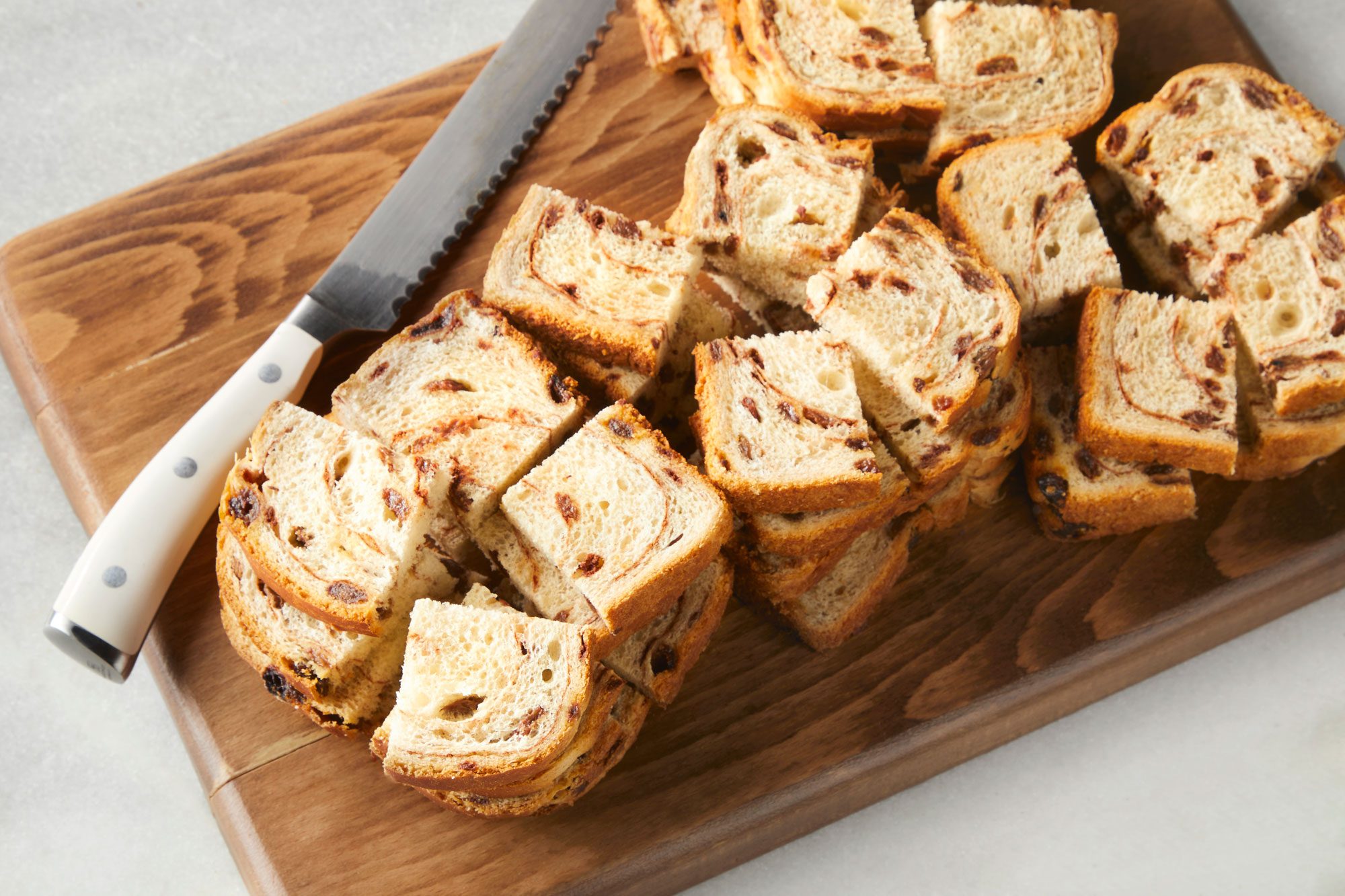 Pumpkin French Toast Casserole on a slicing board