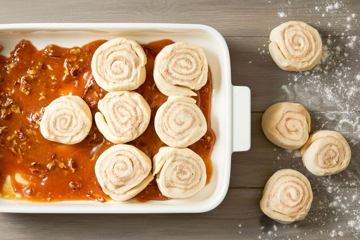 Cut into 12 slices and place slices cut side down over sauce