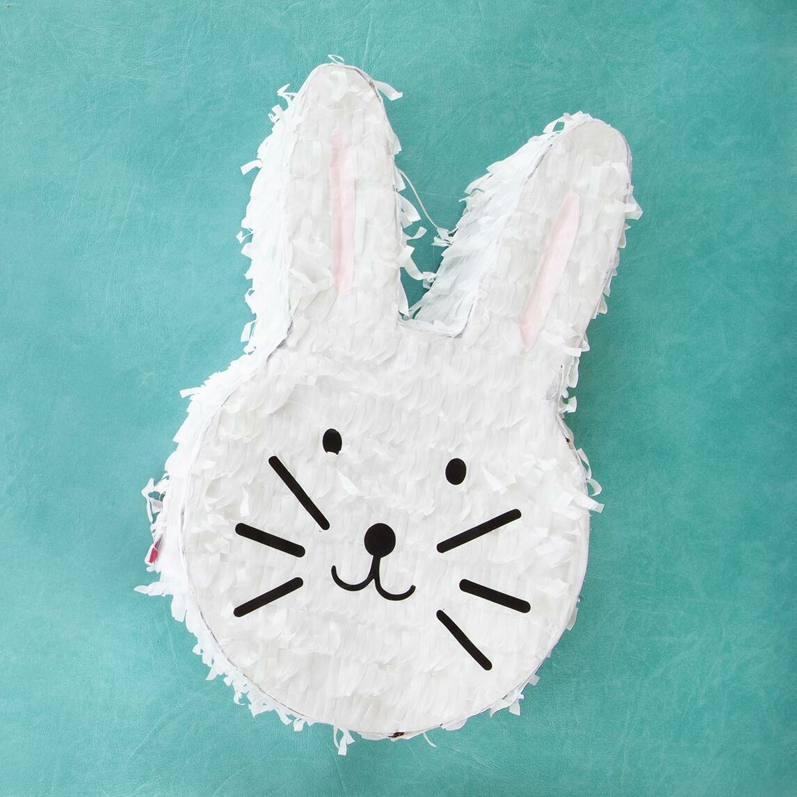 Bunny pinata lying on a floor