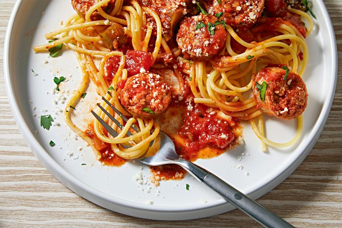 close up of Sausage spaghetti in a white plate