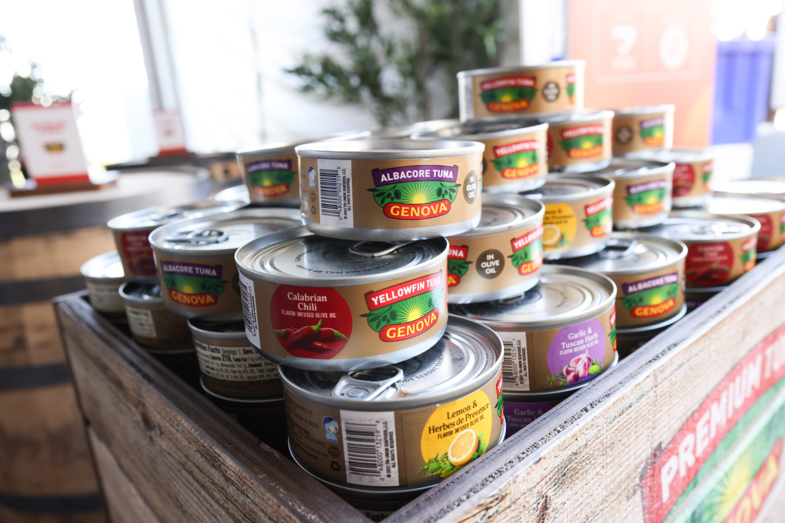 Cans of Genova tuna stacked on a display
