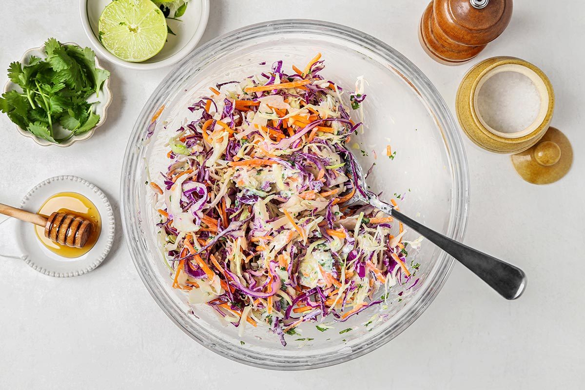A bowl with mixed chopped vegetables.