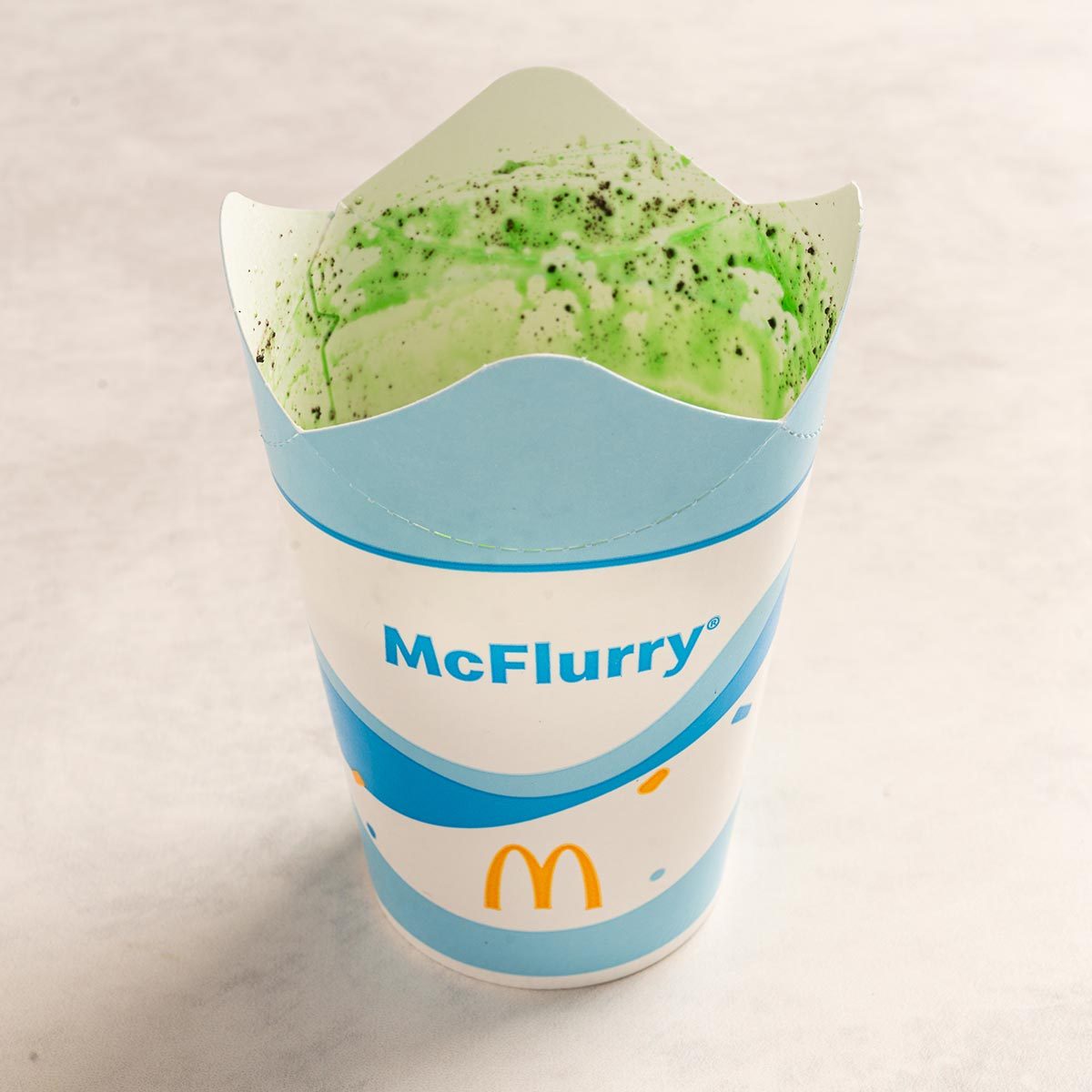 Oreo Shamrock McFlurry on a stone countertop