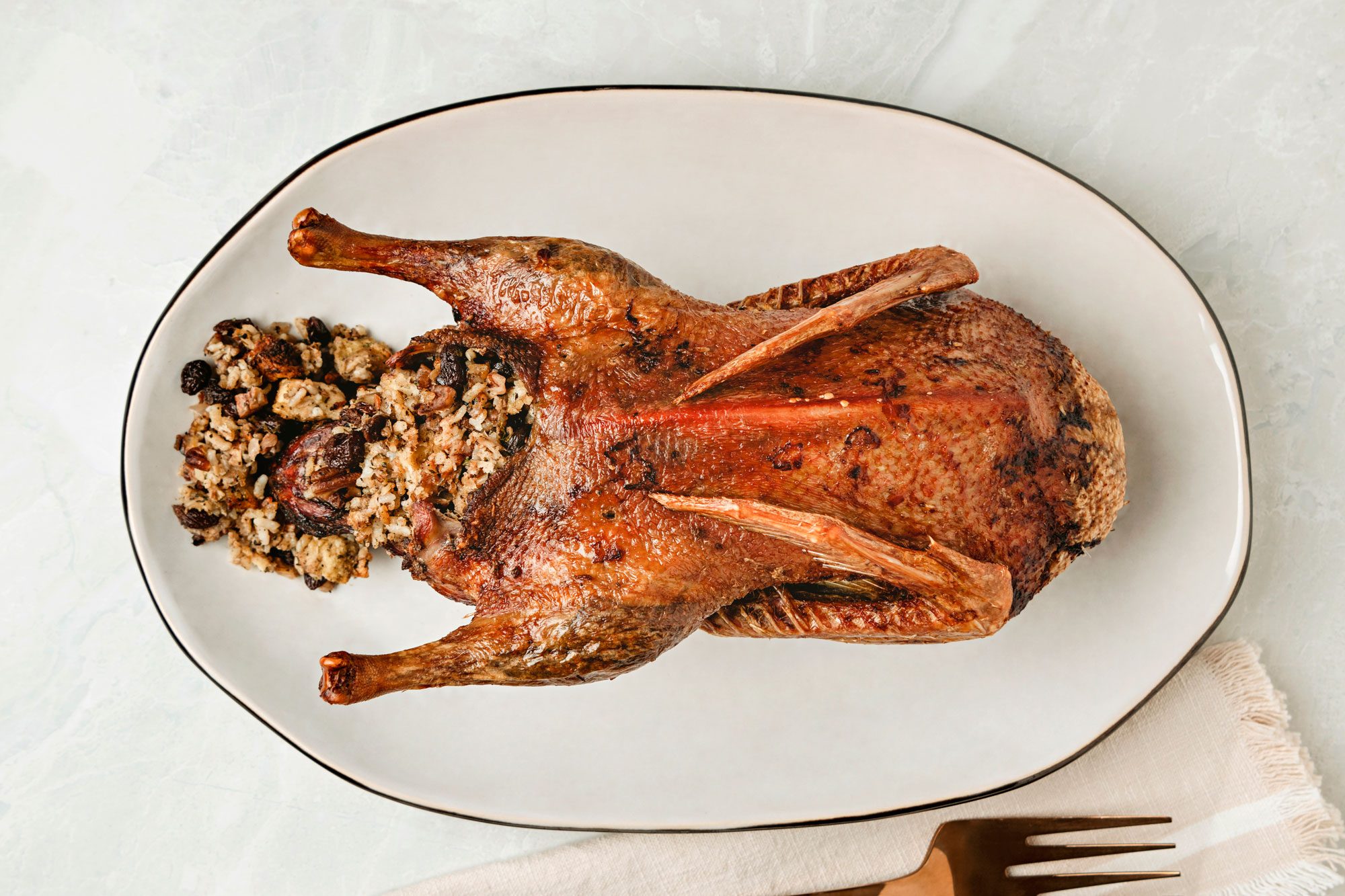 Stuffed Duck is ready and served in a Plate