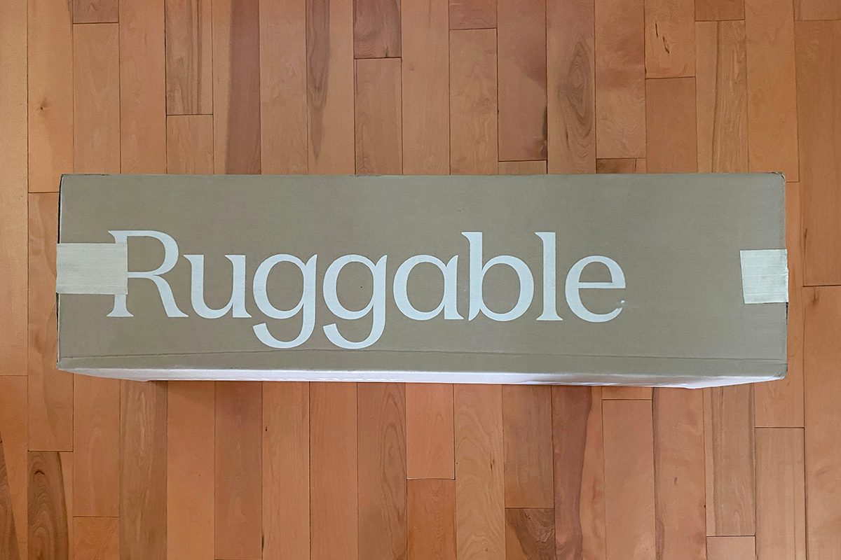 A Ruggable box package lying on the floor.