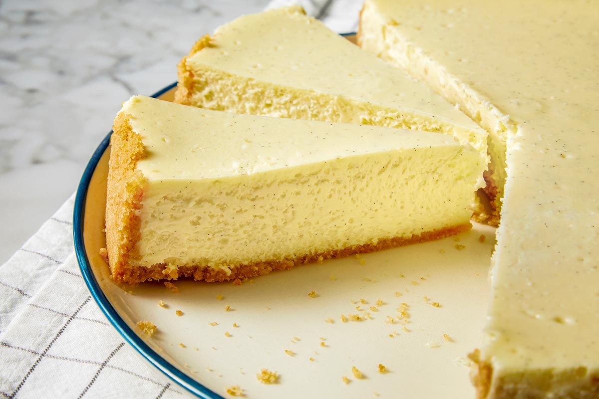 Slices of vanilla bean cheesecake placed on a plate.