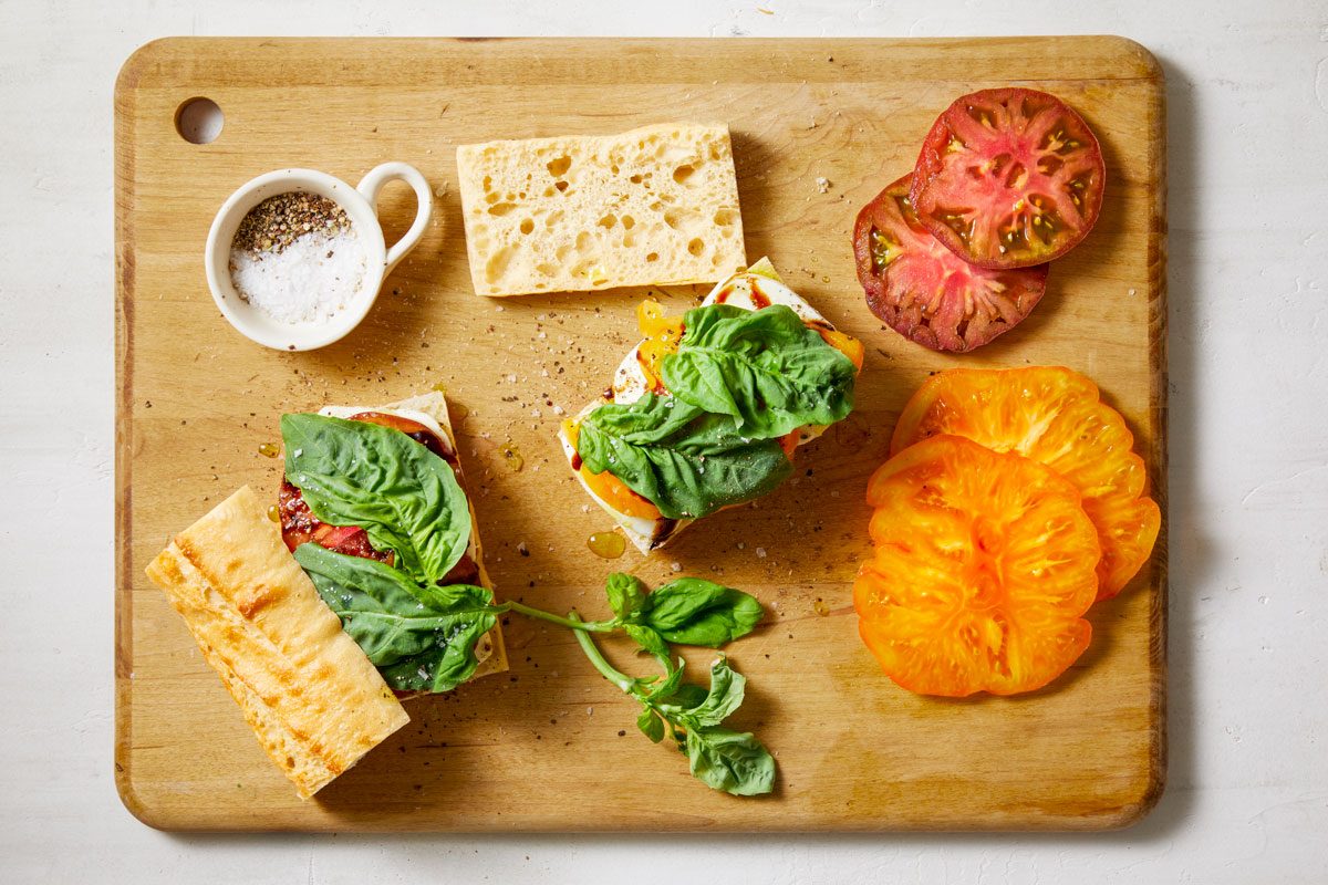 Layer with fresh basil leaves