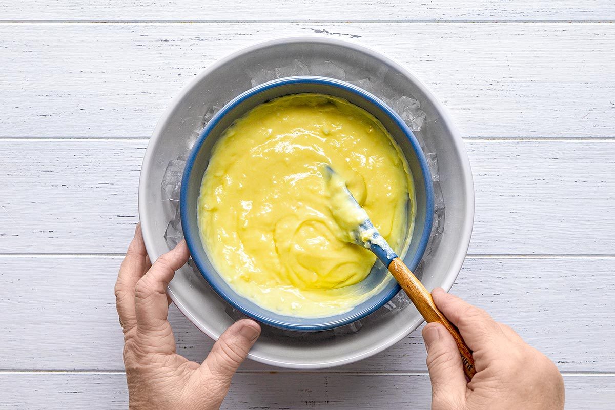 Pastry cream mixture in a bowl placed on ice