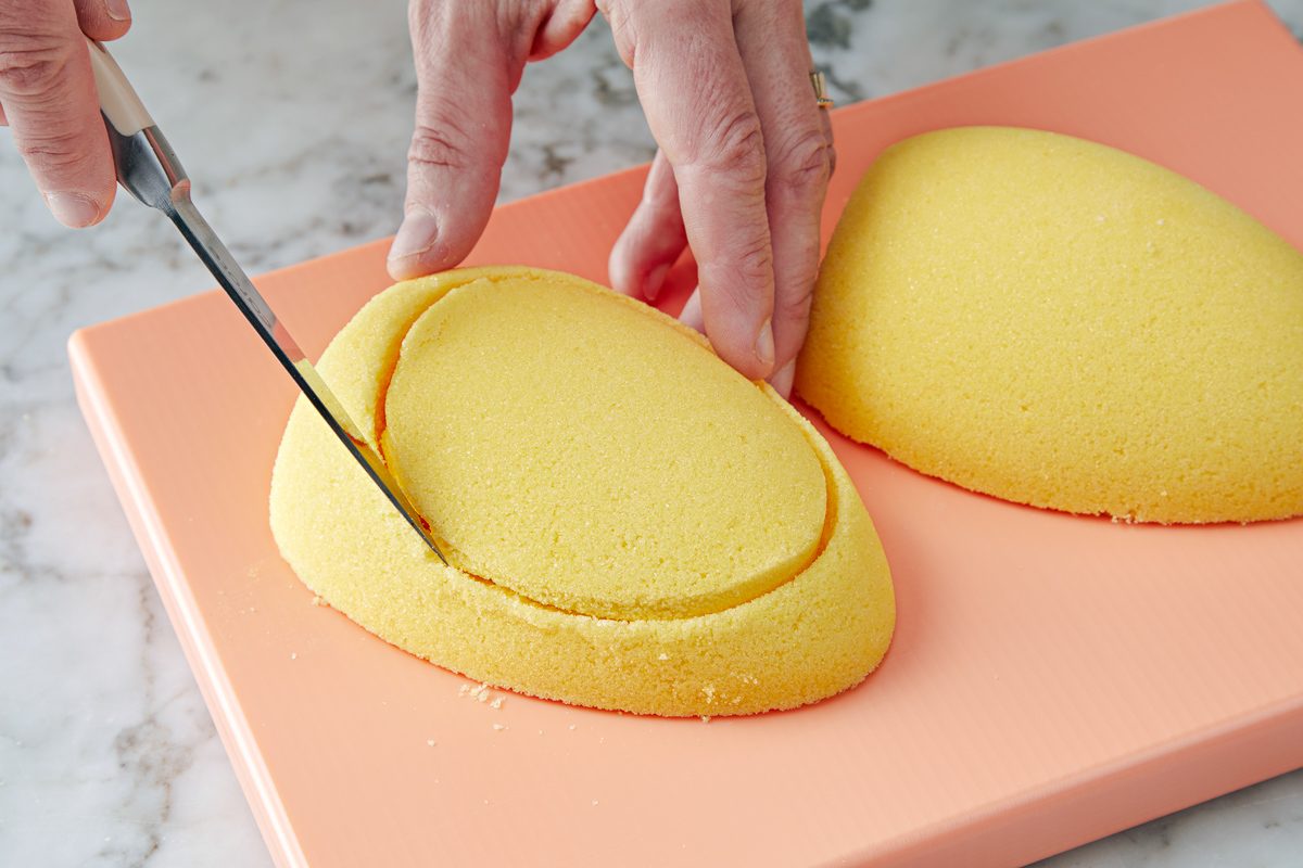 paring knife being used to remove piece of egg