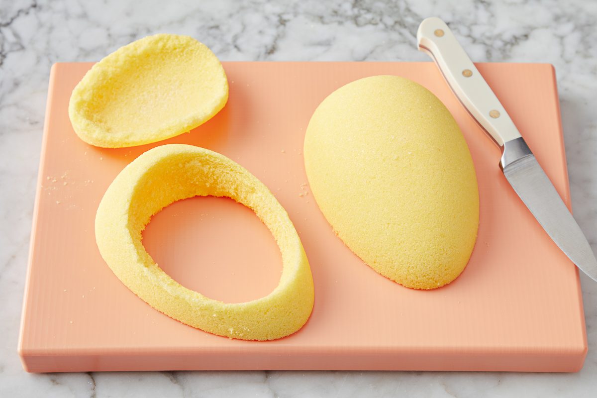window of egg on work surface with egg and knife