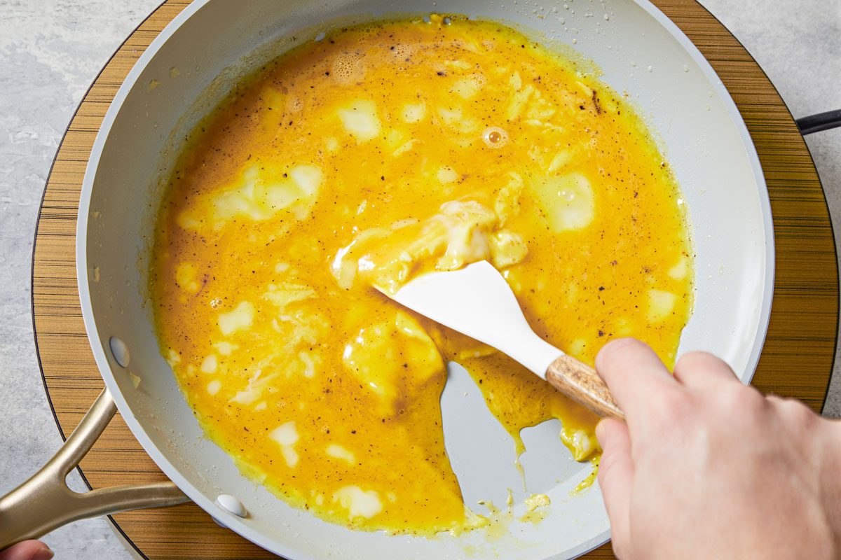 Transfer egg mixture to a pan.