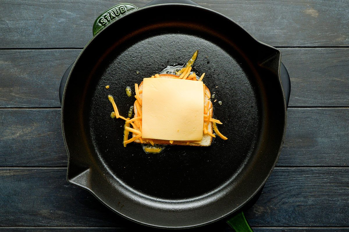 Top with another cheese slice