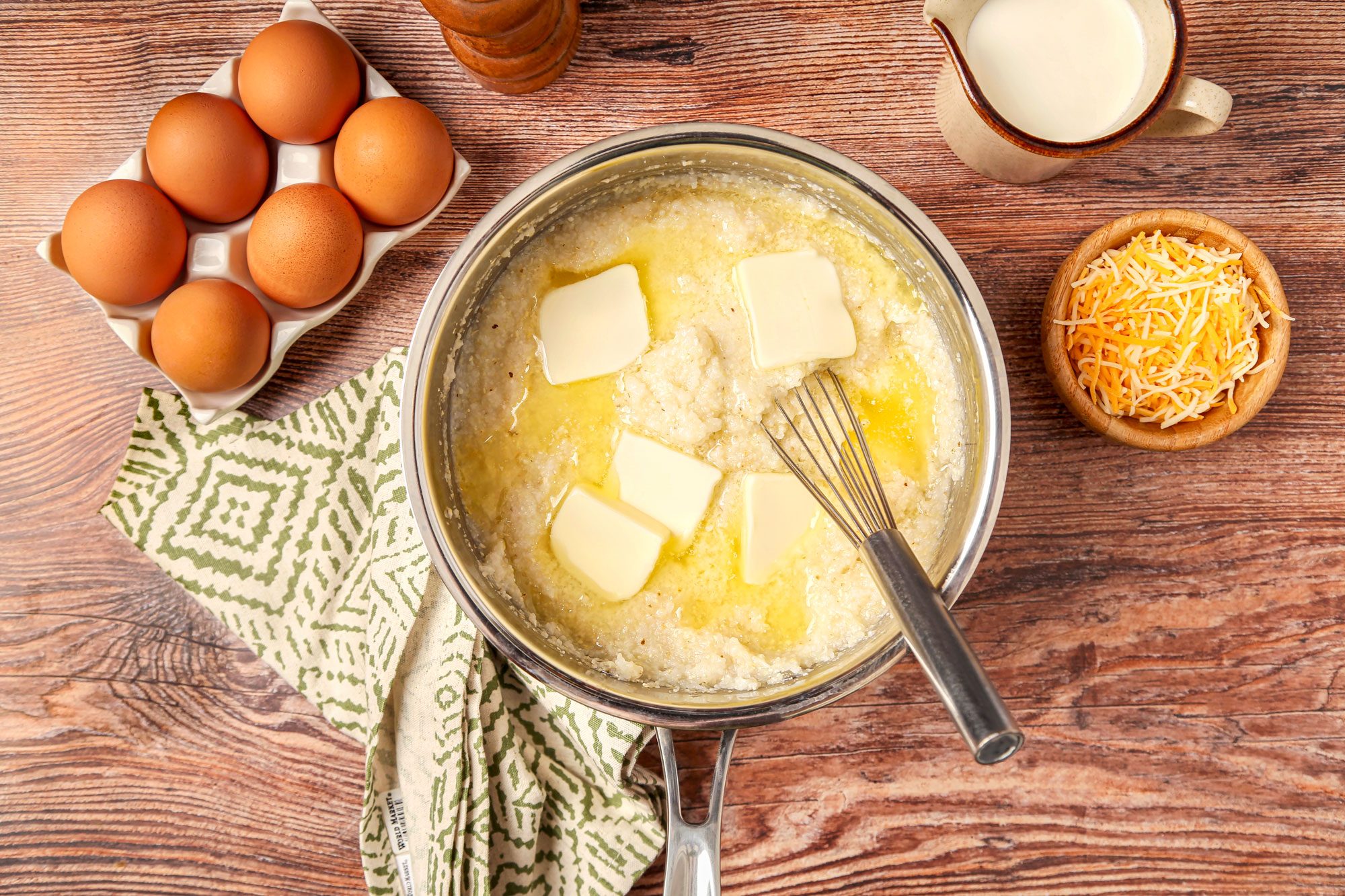 Grits in a saucepan with butter