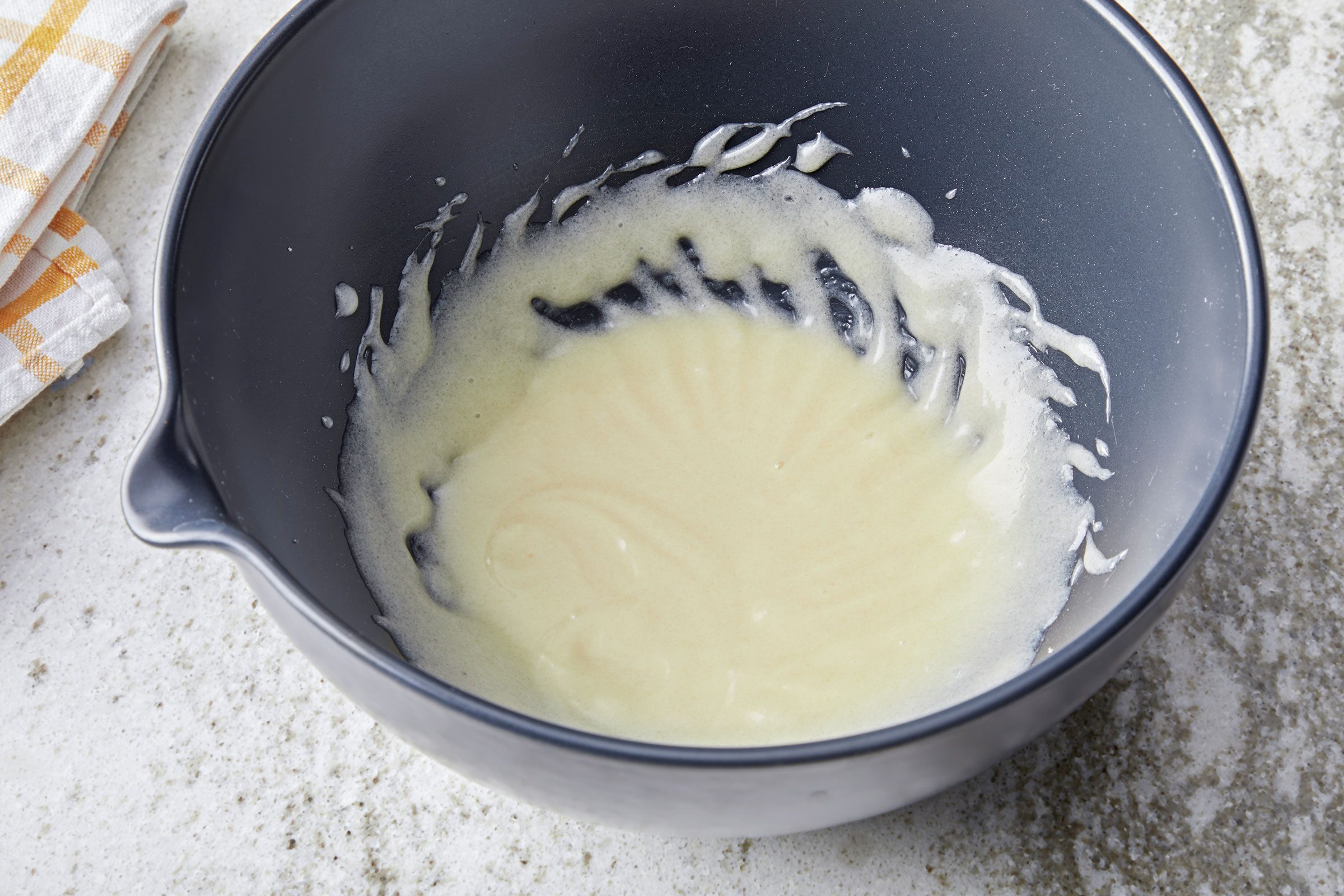 Beaten sugar, canola oil, sour cream and vanilla extract until they’re smooth and fluffy