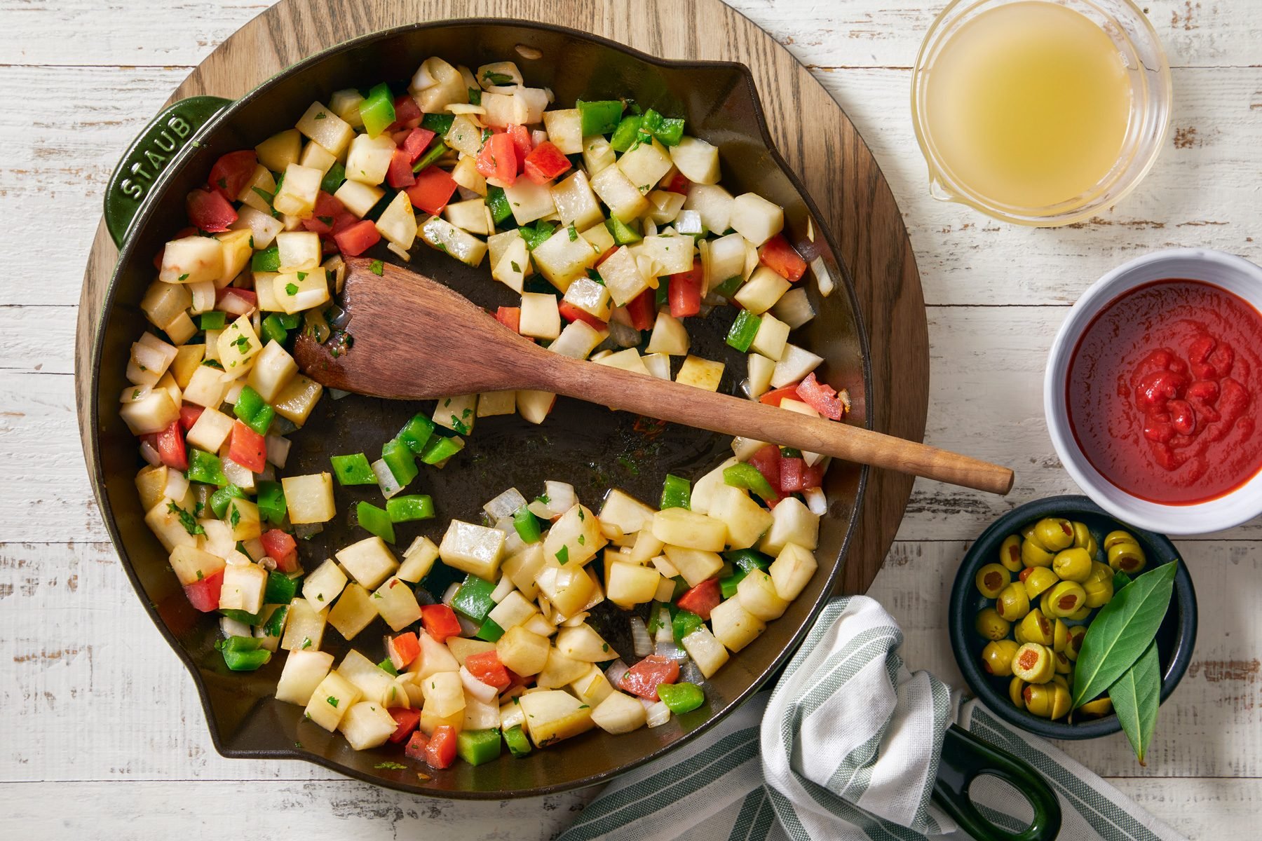 Stir in onion, green pepper, tomatoes, potatoes and cilantro. Cook