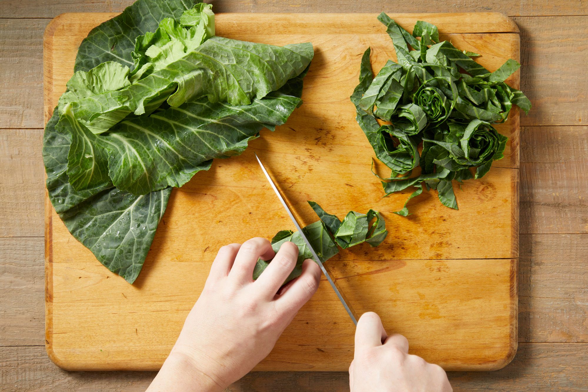 Stack and roll up collards, slice into 1/2-in. thick strips