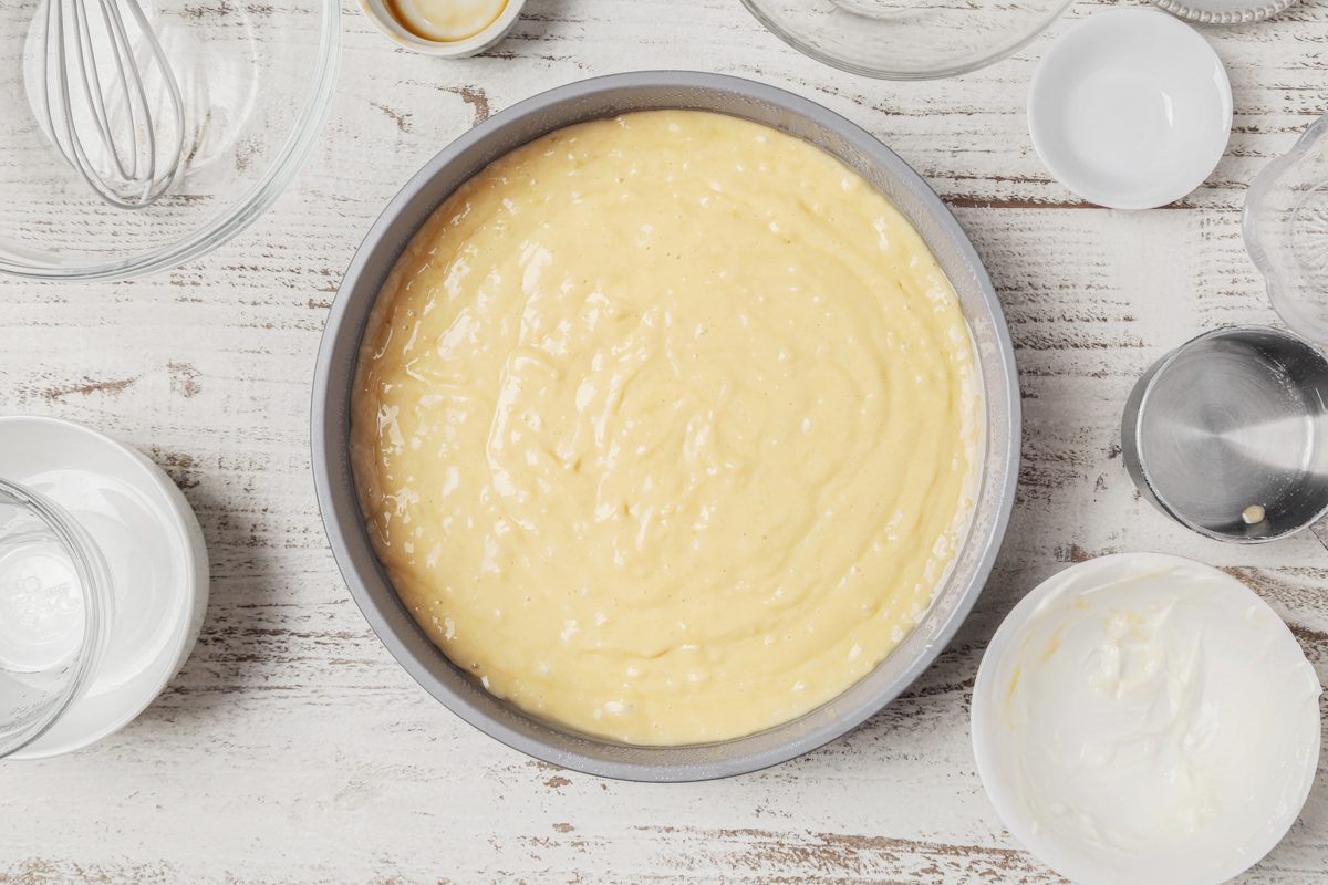 batter poured into a greased 9-inch round baking pan