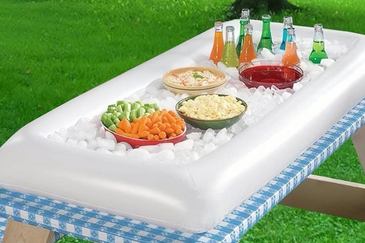 Food and drinks placed on a iflatable buffet over ice