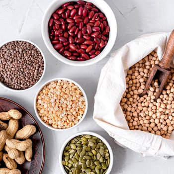 Lentils, Peanuts, Pumpkin Seeds, Chickpeas And Beans In Bowls.