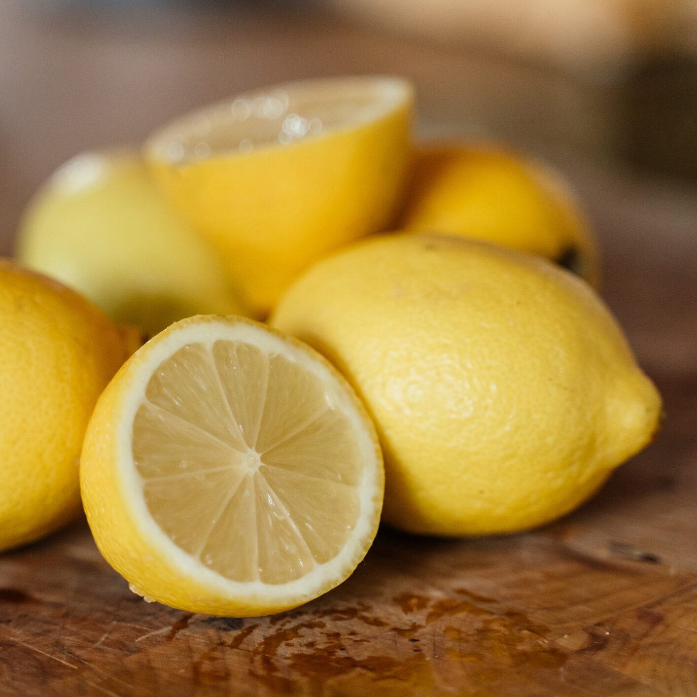 Lemons on a wooden cutting board