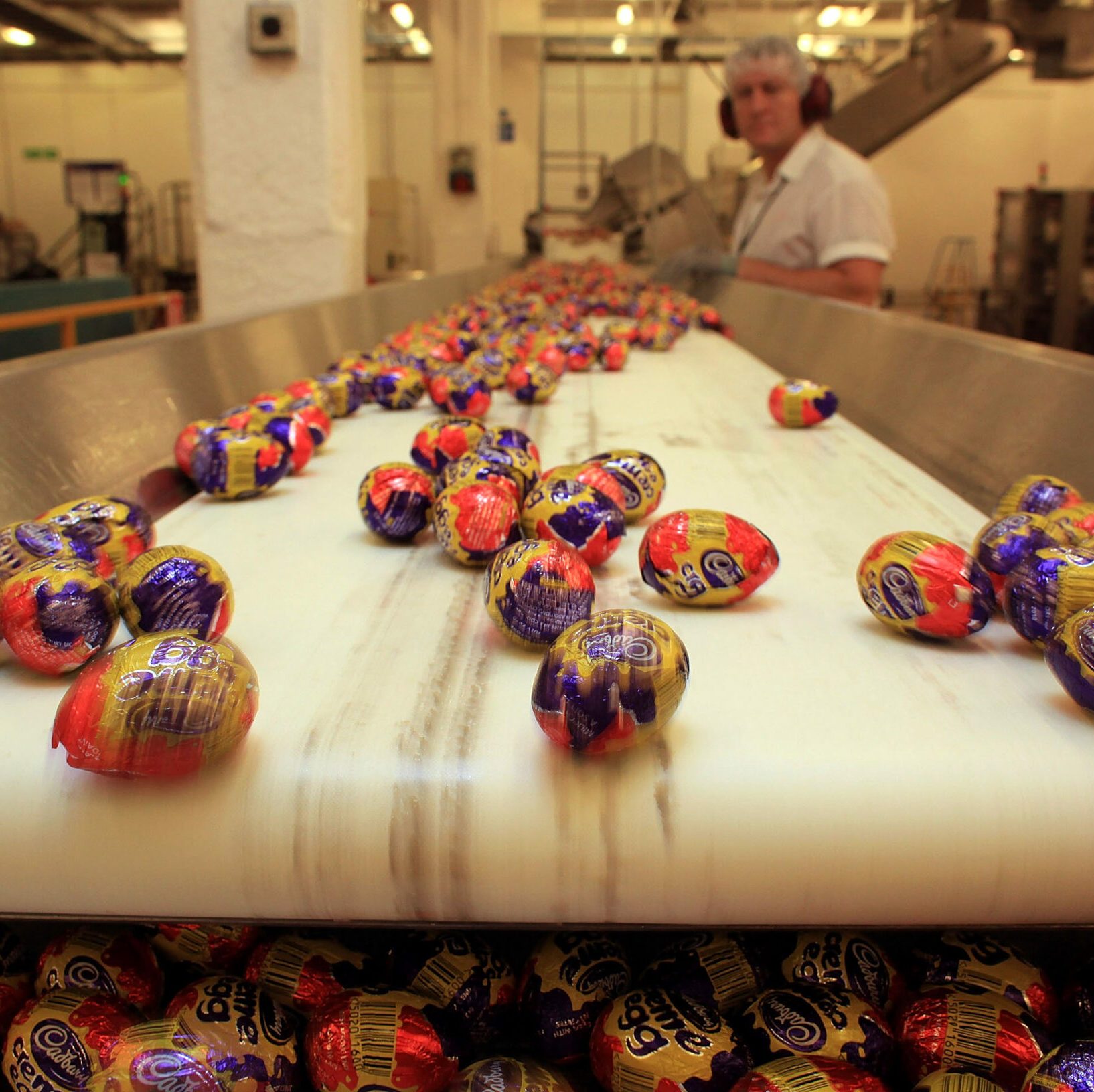 Cadbury Creme Eggs on a conveyor belt at a factory