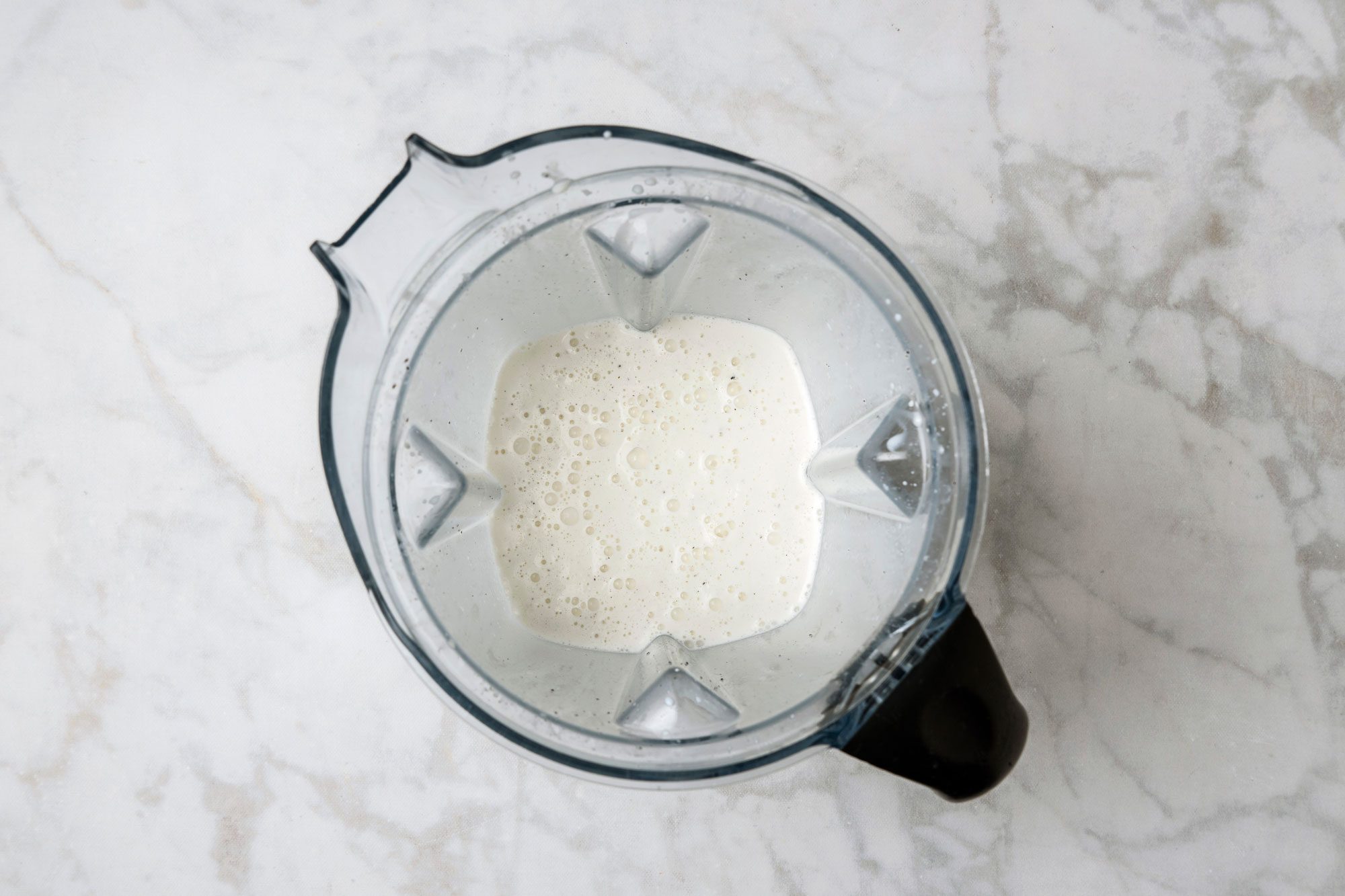 combine milk and ice cream in a blender