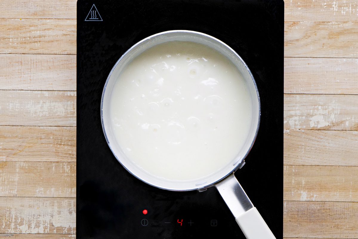 milk added to flour and butter mixture