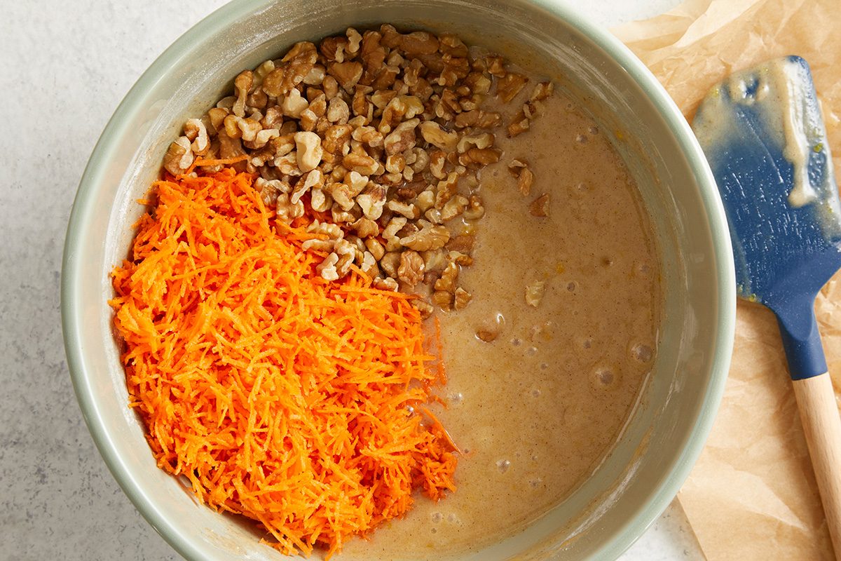 Stir in carrots and walnuts