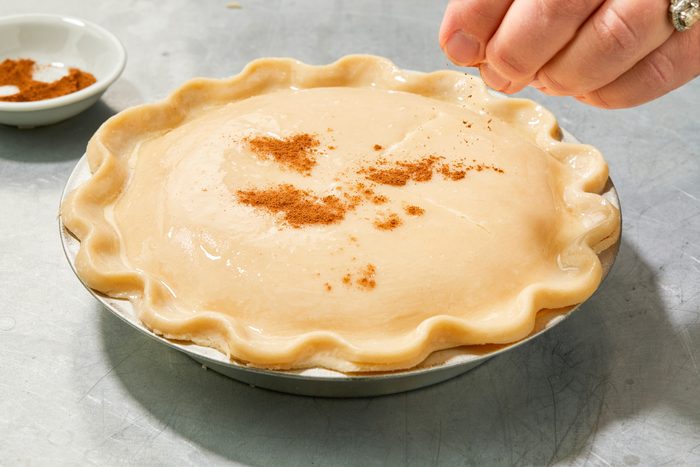 Brush egg white over pastry; sprinkle with remaining 1 half teaspoon cinnamon