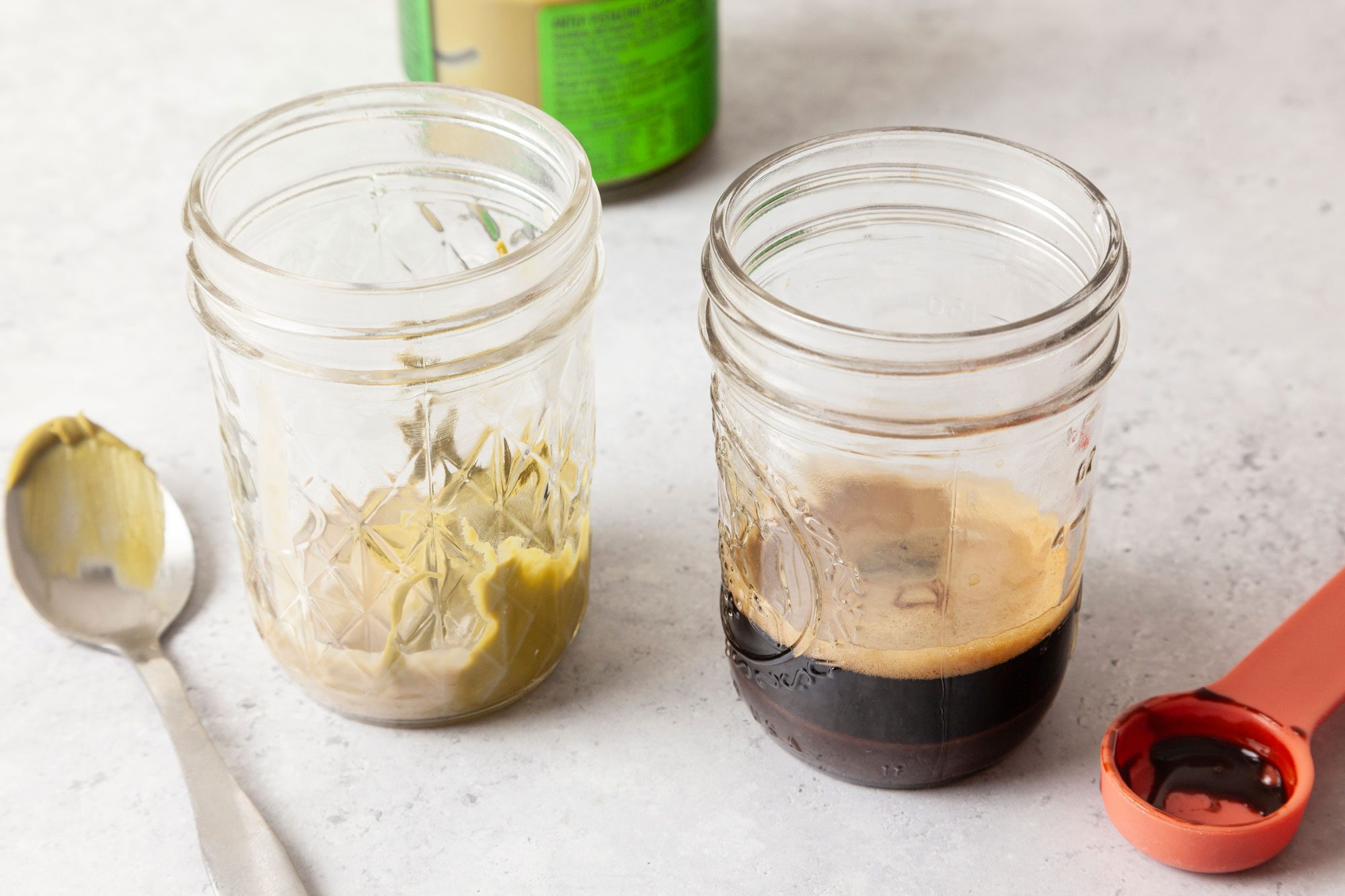 Place chocolate syrup in a 1-cup glass measuring cup; add hot brewed espresso and In a small Mason jar or bowl stir together pistachio cream and tahini