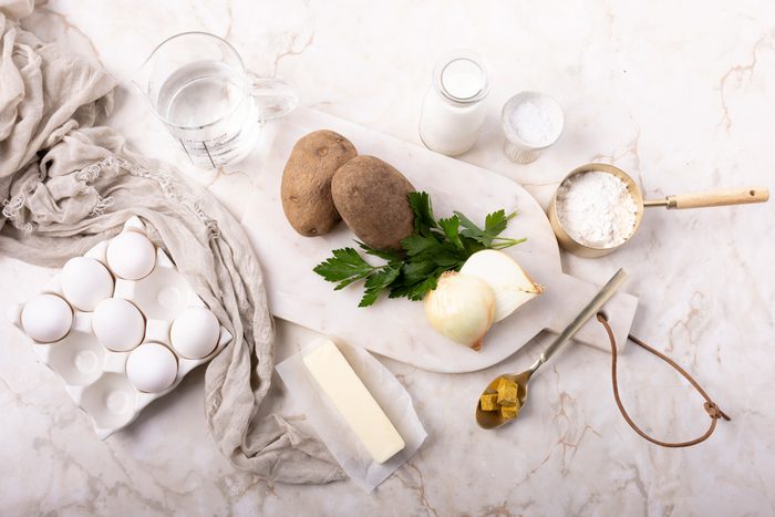 potatoes, butter, eggs, flour, milk, parsley, onions and bouillion cubes