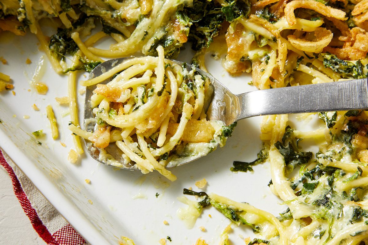Close-up shot of Monterey Spaghetti; in a baking pan with serving spoon