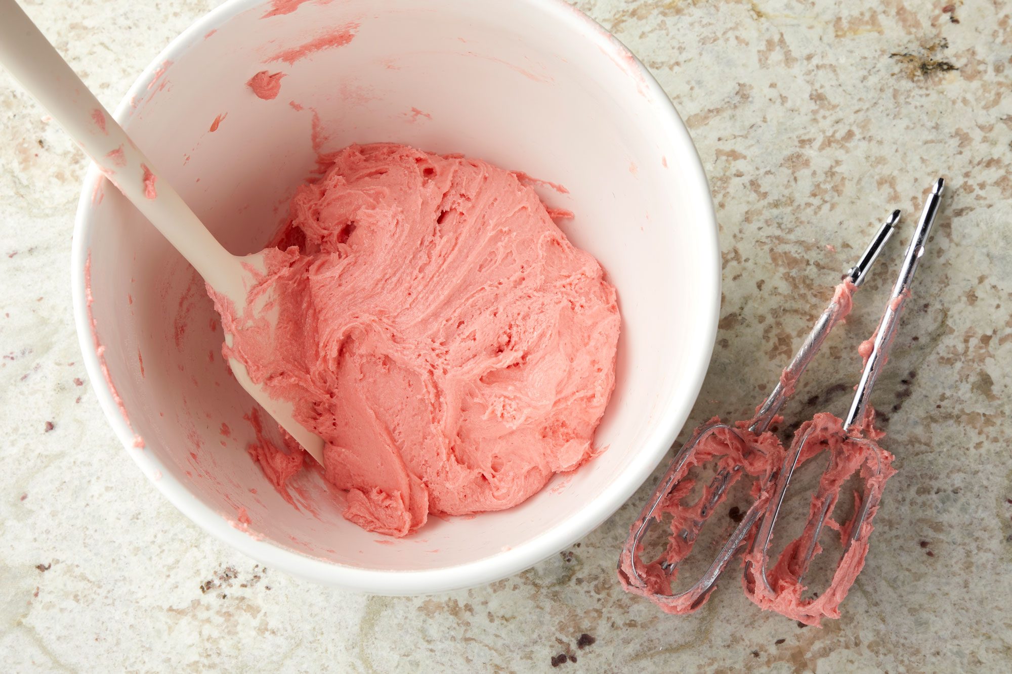 Overhead shot of a large bowl, combine cake mix; oil and eggs until combined; Refrigerate until chilled about 30 minutes; Preheat oven to 350 degree