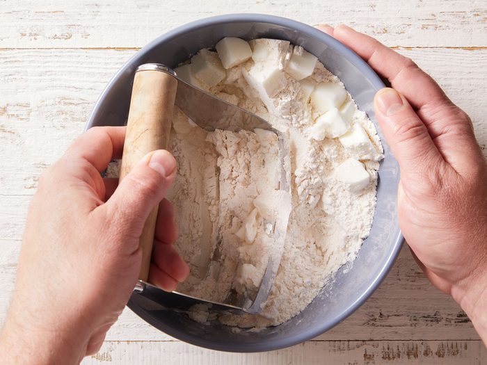 In a small bowl, whisk egg, water and vinegar; gradually add to crumb mixture