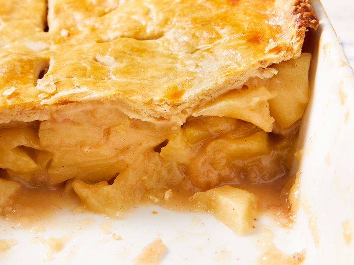 Close up shot of Deep-Dish Apple Pie kept in white tray