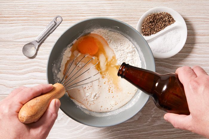 In a shallow bowl, combine flour, baking powder and seasonings. Stir in beer and egg until smooth.