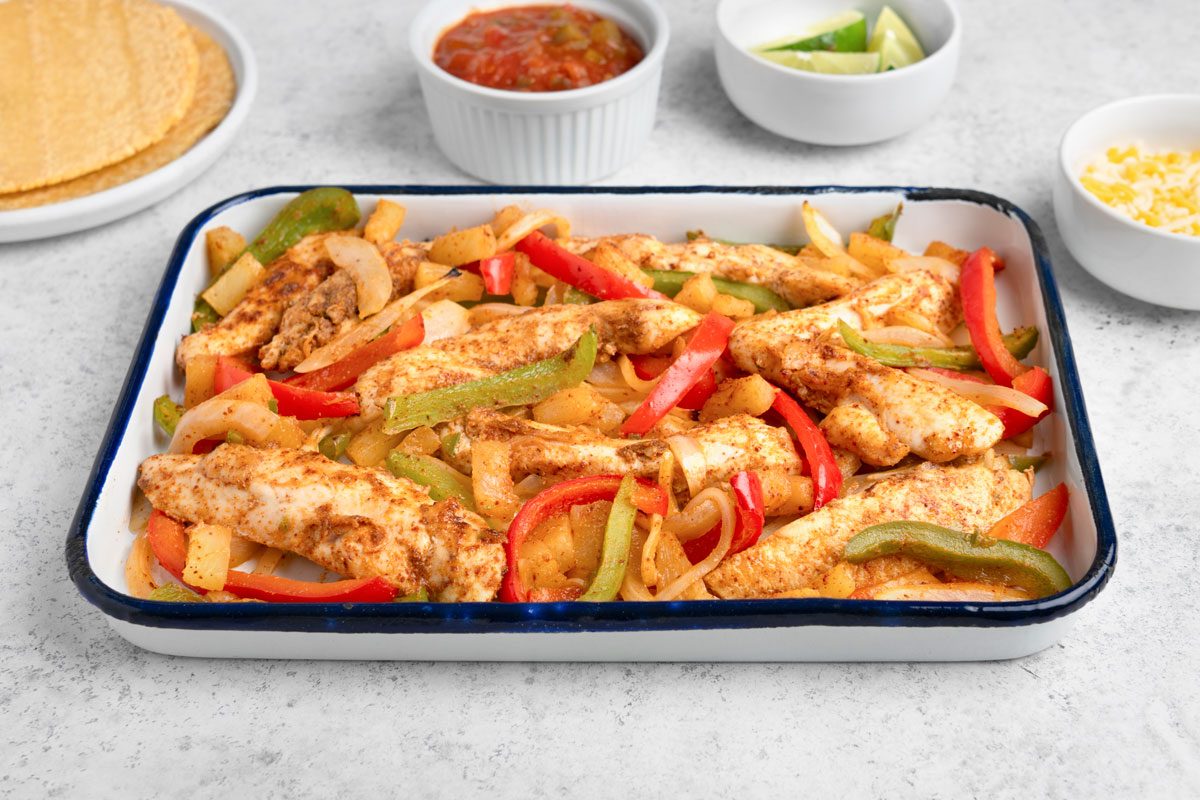 Pineapple Chicken Fajitas is ready and served in a Baking Dish