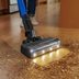 This New Bissell Stick Vacuum Has Headlights So You Don't Miss Any Mess