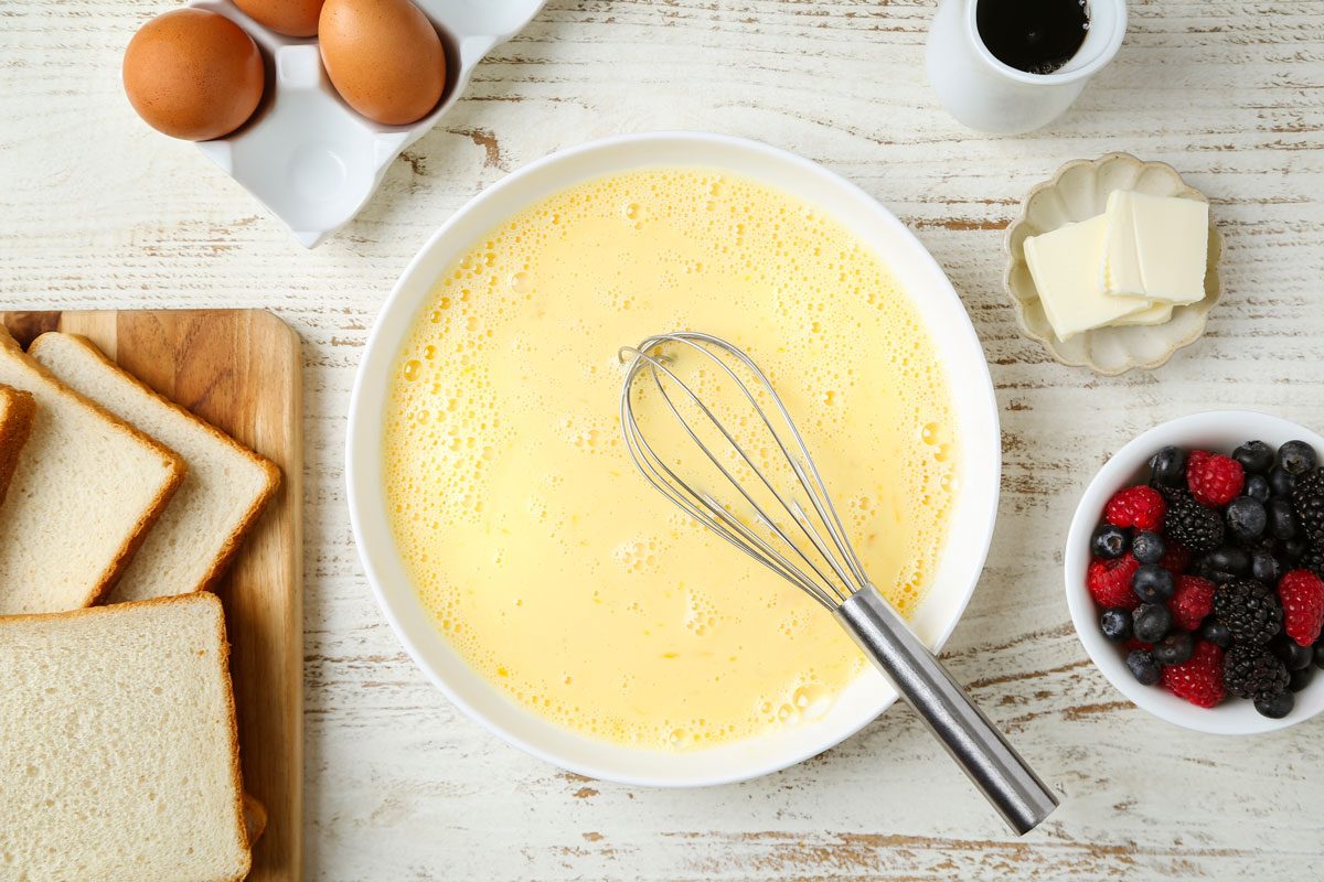 Combine eggs; milk; sugar; vanilla extract and salt in a griddle