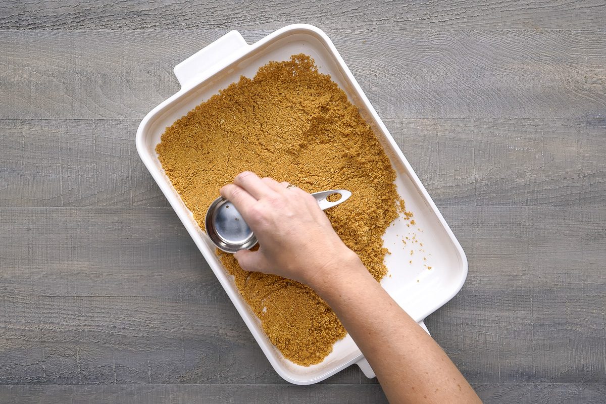 crumbs pressed onto the bottom of a 13x9-inch baking dish