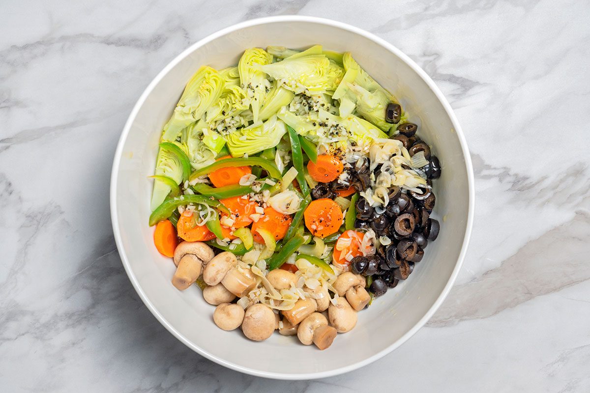 Marinated misxture pored to the boiled vegetable