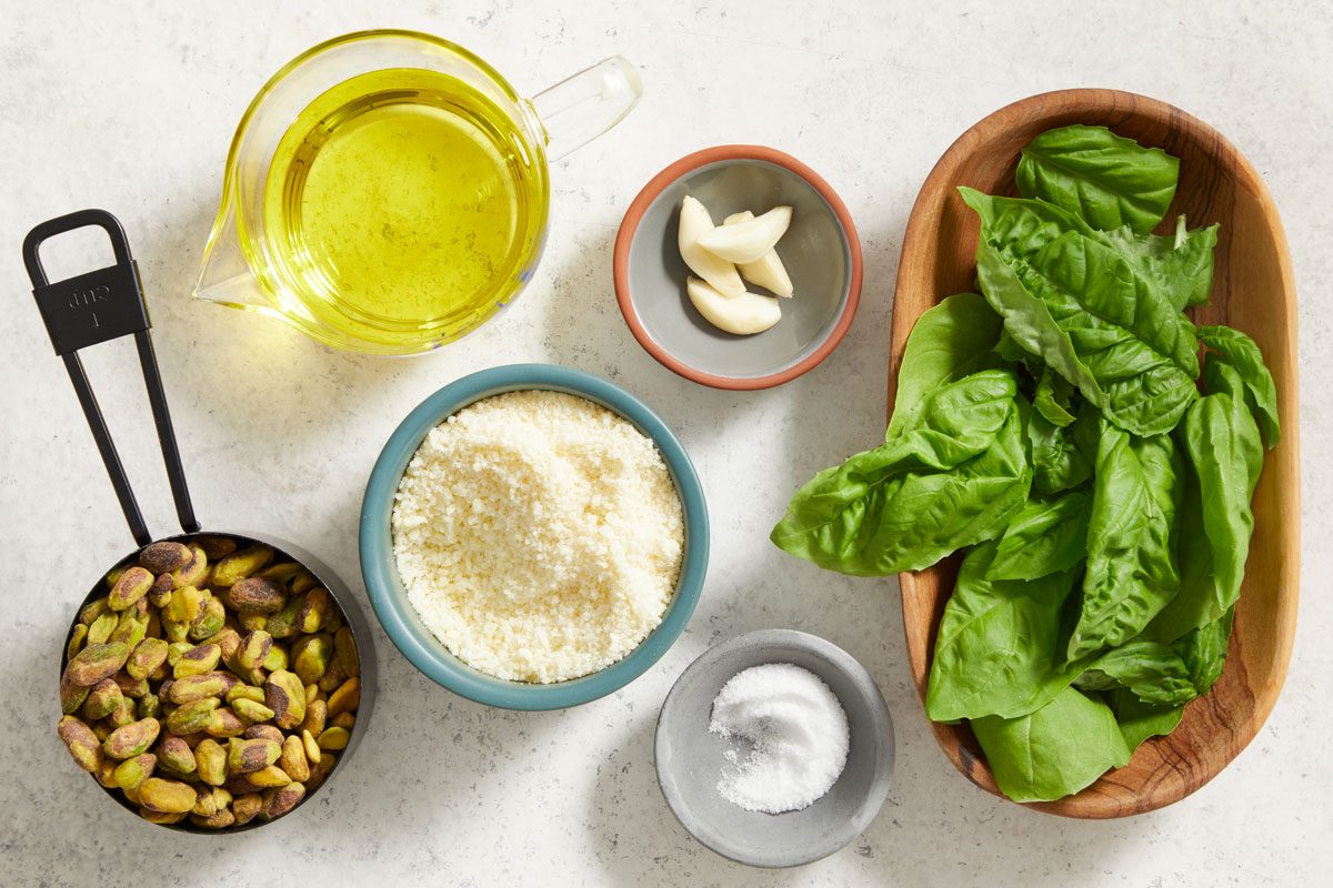 Overhead shot of ingredients for Pistachio Pesto on the counter