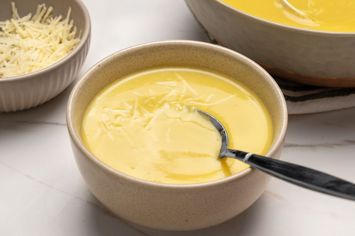 3/4 shot of Yellow Squash Soup;