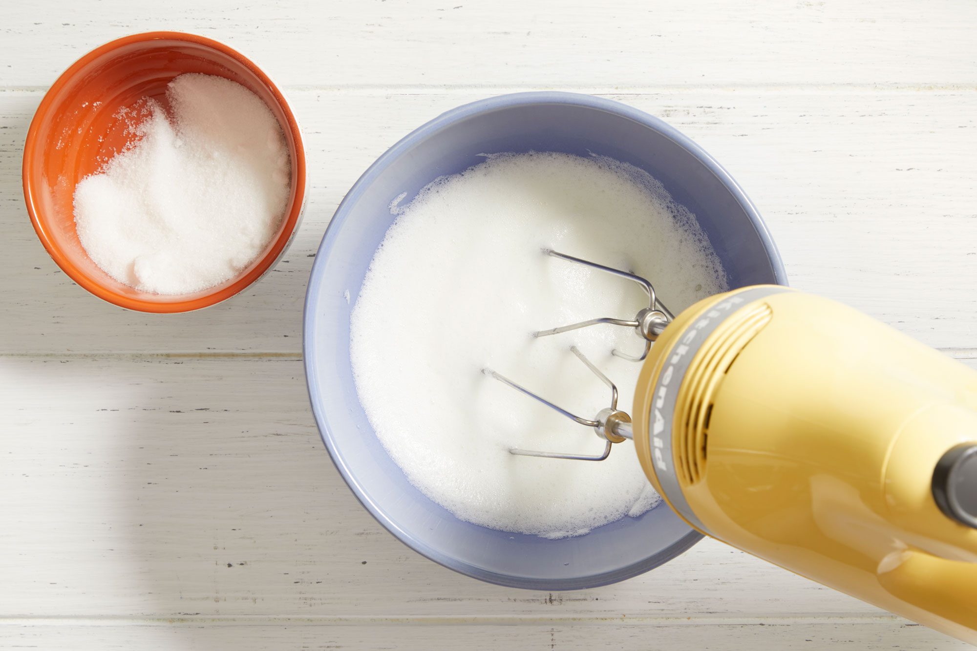 In a separate bowl, beat egg whites